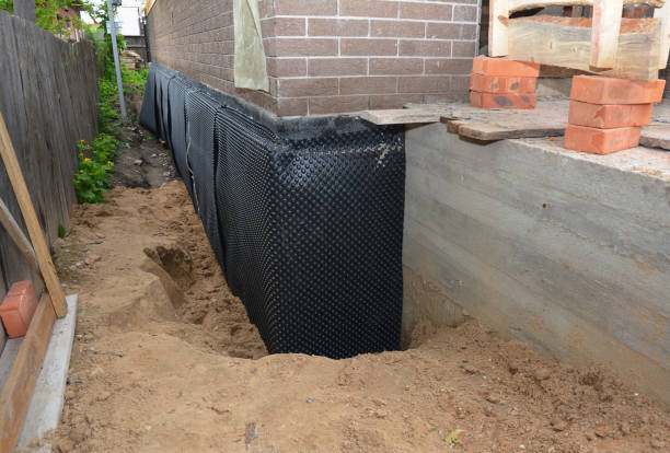 Happy homeowners after waterproofing job in Closter